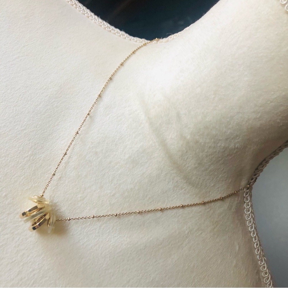 Anne Klein gold and iridescent disc necklace